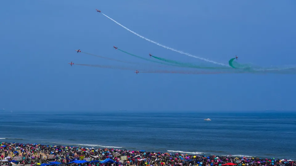 Indian Air Force's (IAF) aerobatics team 'Surya Kiran' performs during an air show as part of the 92nd anniversary celebrations of IAF, at Marina Beach, in Chennai, Sunday, Oct. 6, 2024.