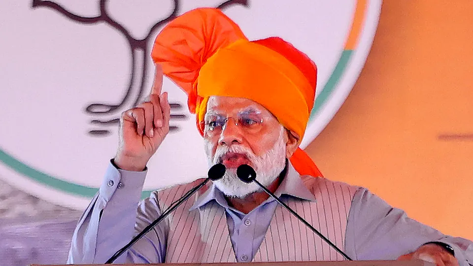 Prime Minister Narendra Modi addresses at the laying foundation stone of development projects, in Bikaner, Saturday, July 8