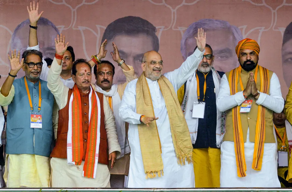 Union Home Minister Amit Shah others during a public meeting in Lakhisarai district