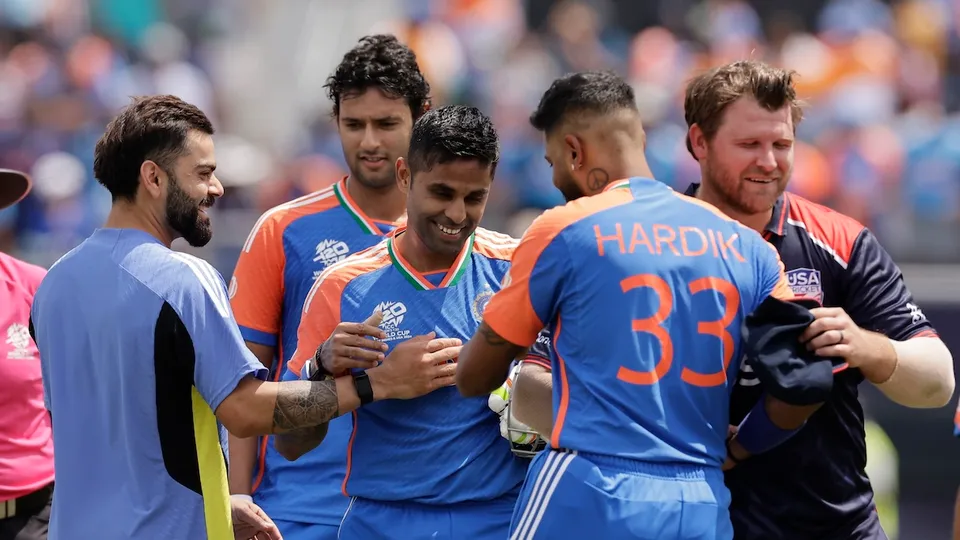 Suryakumar Yadav, center, celebrates with teammates after their win in the ICC Men's T20 World Cup cricket match between United States and India at the Nassau County International Cricket Stadium in Westbury, New York, Wednesday, June 12, 2024