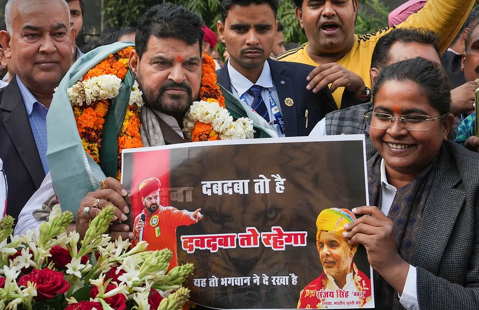 BJP MP Brij Bhushan Sharan Singh with supporters after UP Wrestling Association Vice President Sanjay Singh became the new President
