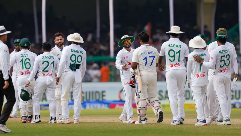 Virat Kohli and Rishabh Pant being congratulated by Bangladesh players after winning the second test cricket match, at the Green Park stadium, in Kanpur, Tuesday, Oct. 1, 2024.
