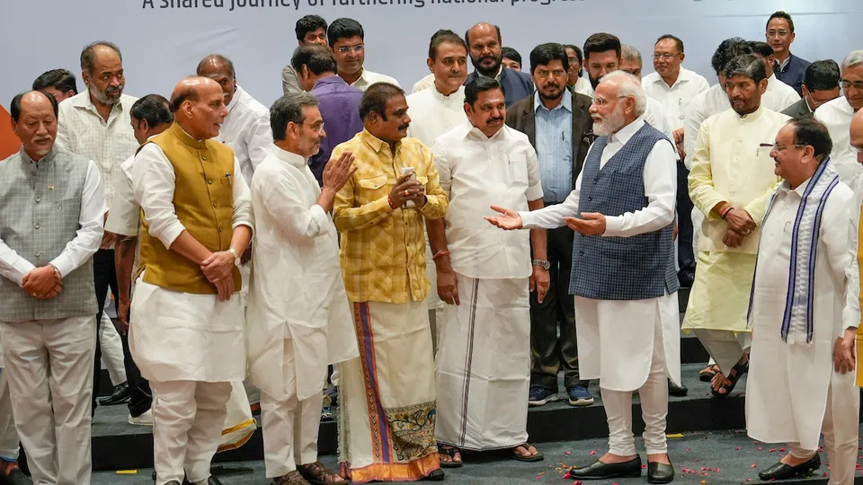 Prime Minister Narendra Modi exchanges greetings Ramdas Athwale, Chirag Paswan and other NDA leaders during the meeting of the National Democratic Alliance (NDA) ahead of the next year's Lok Sabha polls, in New Delhi, Tuesday, July 18