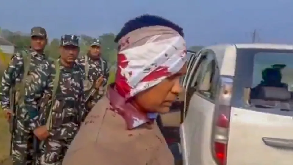 Ed official after getting assaulted allegedly by the supporters of TMC leader Sheikh Sajahan during a raid at the latter s residence, in North 24 Parganas