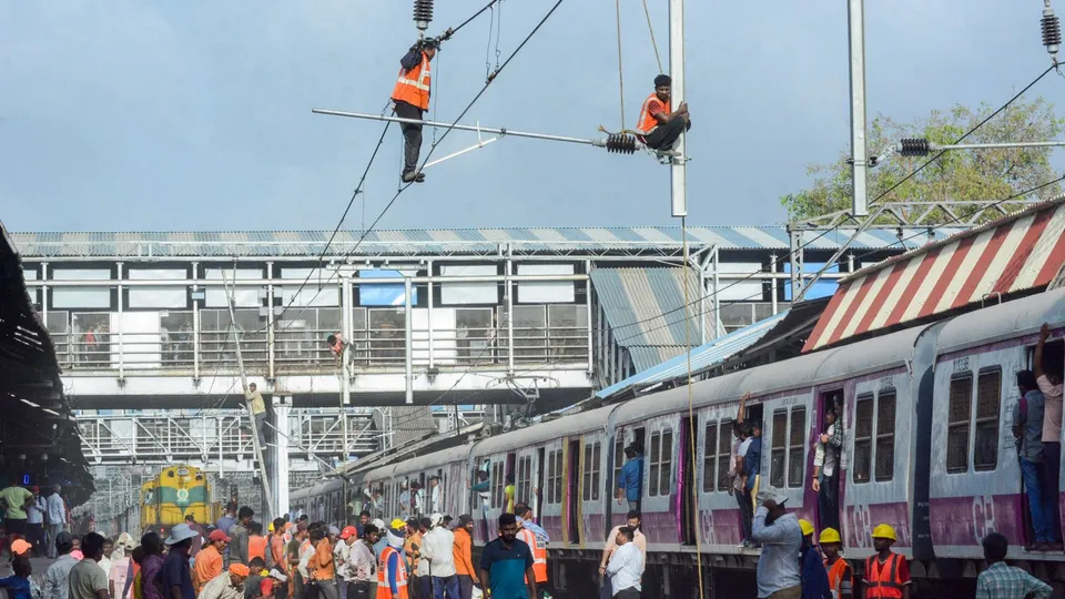 Workers during a 63-hour mega block conducted for widening and extension of platforms 5 and 6 of Thane railway station, Friday, May 31, 2024