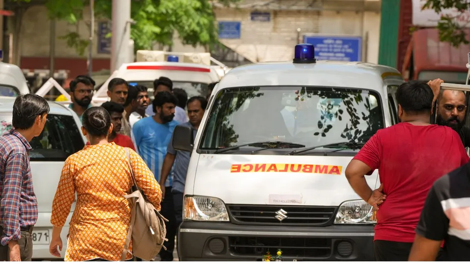 An ambulance carrying body of one of the three civil services aspirants who died after the basement of a coaching centre was flooded by rainwater leaves from Ram Manohar Lohia Hospital premises, in New Delhi, Sunday, July 28, 2024.