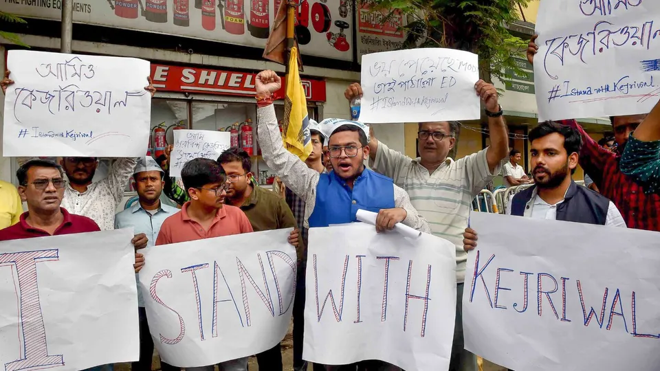 AAP workers stage a protest against the arrest of their leader and Delhi Chief Minister Arvind Kejriwal, in front of the BJP office, in Kolkata