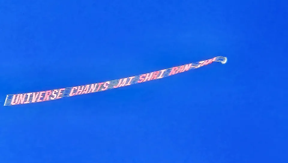 An aerial banner reads ‘Universe Chants Jai Shree Ram’ crosses Houston skies through a plane during a celebration of the consecration ceremony of Ayodhya’s Ram Mandir.