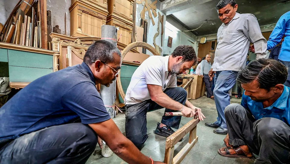 Congress leader Rahul Gandhi during his visit to the furniture market, at Kirtinagar in New Delhi, Thursday