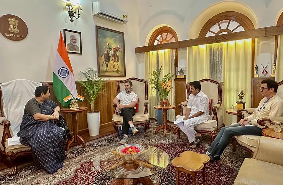 Congress leader Rahul Gandhi interacts with Manipur Governor Anusuiya Uikey during a meeting, at the Raj Bhavan in Imphal, Friday.jpg