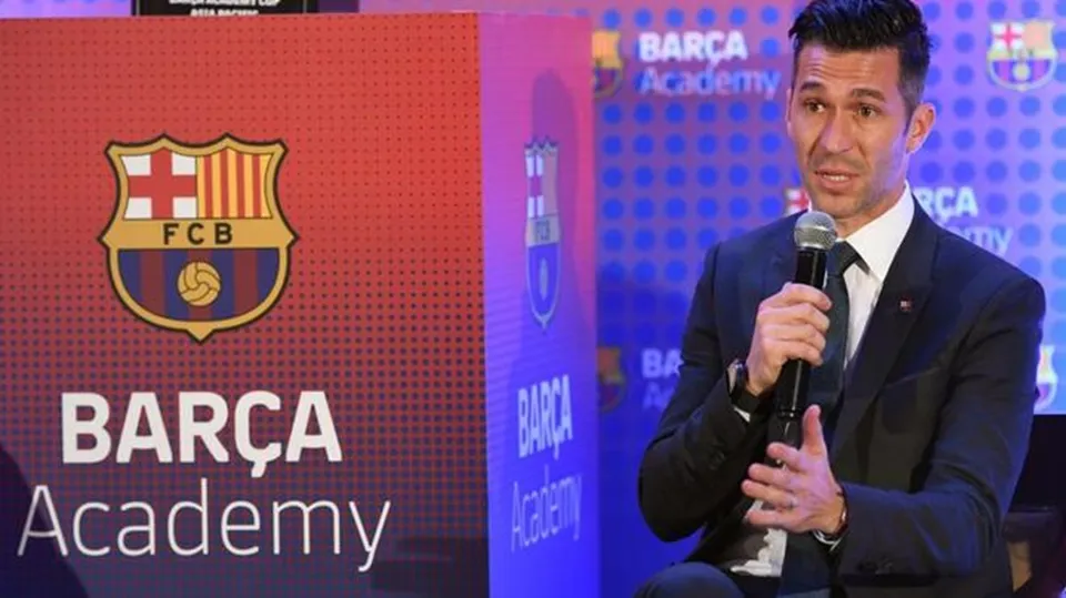 Former Barcelona FC midfielder Luis Garcia speaks at a Barca Academy event in New Delhi