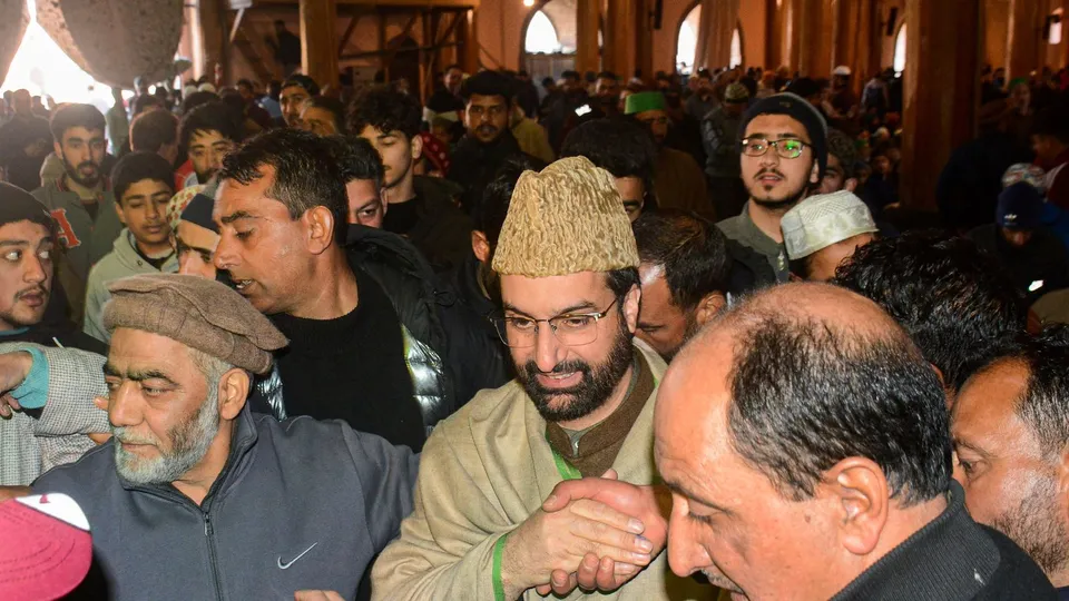 Chairman of Hurriyat Conference and Chief Clerk of Jammu and Kashmir Mirwaiz Umar Farooq interacts with supporters