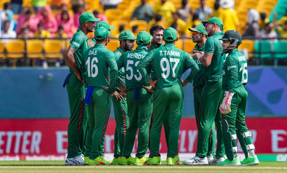 Bangladesh team celebrates the wicket of Afghanistan's Ibrahim Zadran during an ICC Men’s World Cup 2023 match, at HPCA Stadium, in Dharamshala