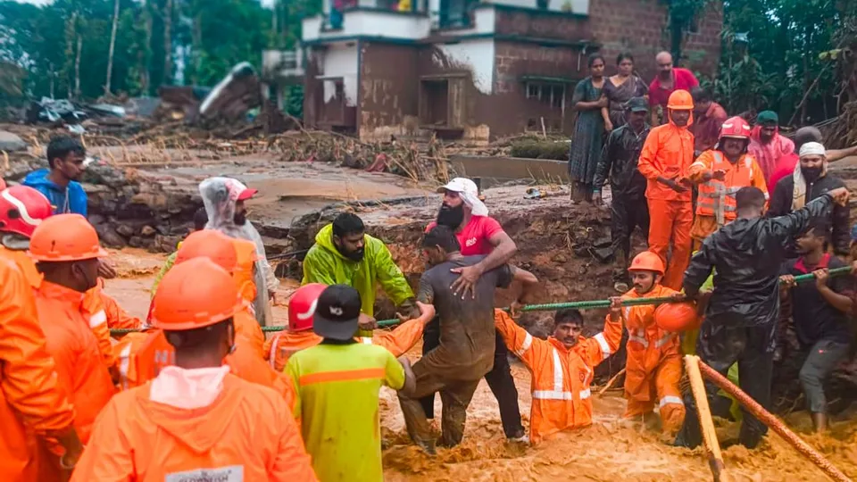 National Disaster Response Force (NDRF) personnel conduct rescue operation after huge landslides in the hilly areas near Meppadi, in Wayanad district, Kerala, Tuesday, July 30, 2024