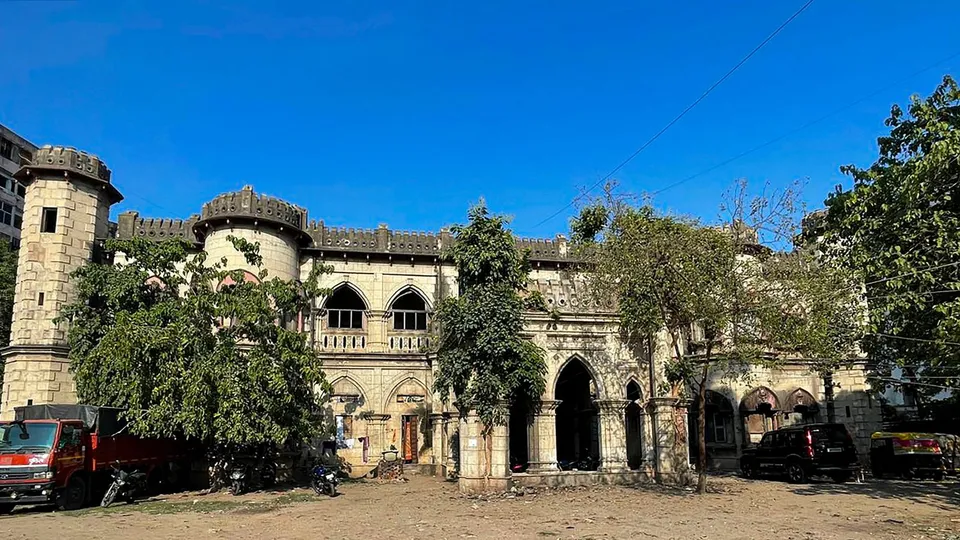 Vegetation grown on the decaying facade of the nearly century-old Rizwan castle in the heart of Patna, Monday, May 27, 2024