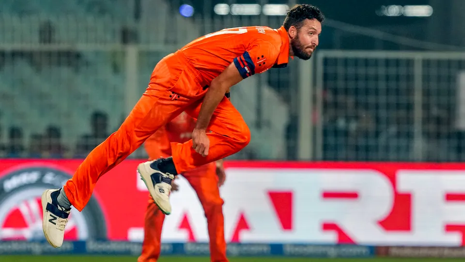 Netherlands bowler Paul van Meekeren bowls during the ICC Men's Cricket World Cup 2023 match between Bangladesh and Netherlands, at Eden Gardens in Kolkata, Saturday, Oct. 28, 2023.