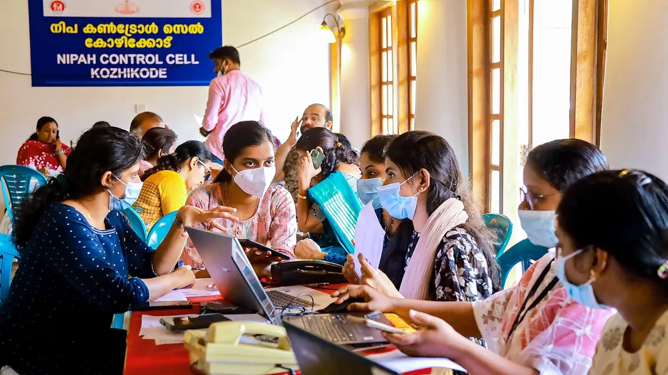 Health workers at a control room set up amid Nipah virus outbreak in Kerala, in Kozhikode