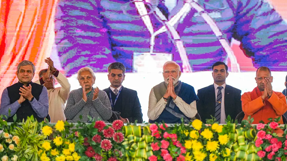 Prime Minister Narendra Modi with Uttar Pradesh Governor Anandiben Patel, Chief Minister Yogi Adityanath and others during a public meeting, in Ayodhya, Saturday, Dec. 30, 2023