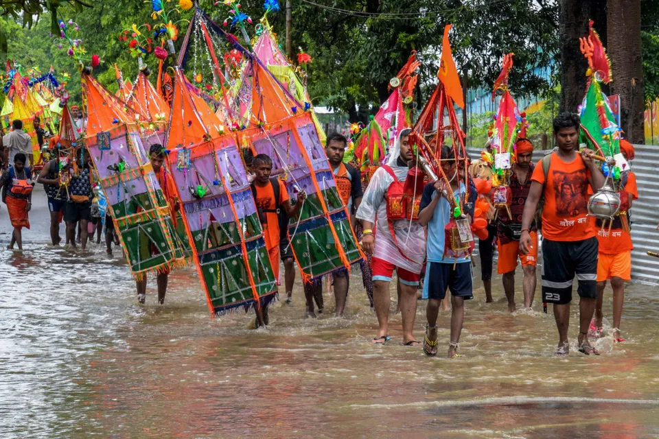 Lord Shiva devotees or Kanwariyas during the 'Kanwar Yatra' pilgrimage in the holy month of 'Shravan', in Haridwar