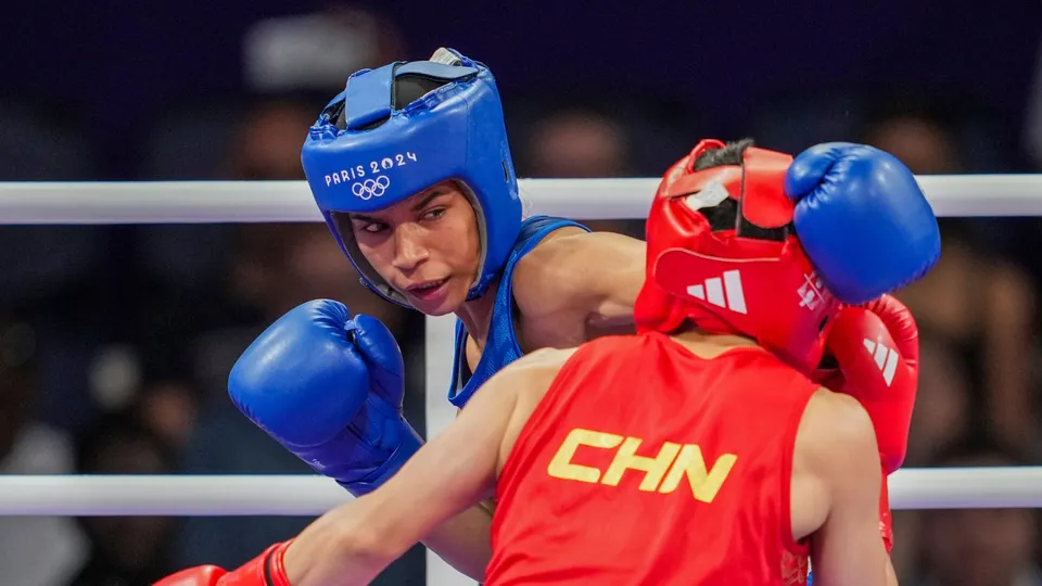 India's Nikhat Zareen (in blue) and China's Wu Yu during their women's 50kg Round of 16 boxing match at the 2024 Summer Olympics, in Paris, France, Thursday, Aug. 1, 2024.