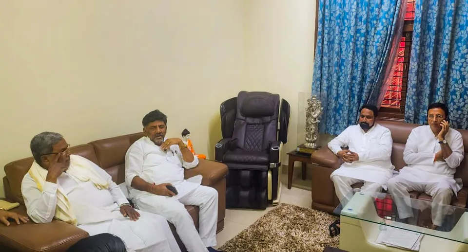KPCC President D K Shivakumar and AICC General Secretary Randeep Singh Surjewala meet with BJP senior leader and former Deputy CM Laxman Savadi