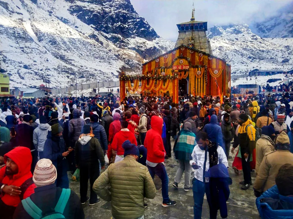 Devotees during the opening of the doors of the Kedarnath Temple, in Rudraprayag district