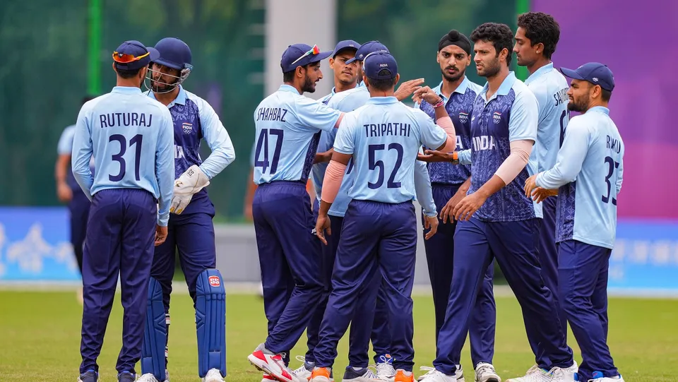 Indian players celebrate the dismissal of a Bangladeshi batter during men's cricket semifinal match between India and Bangladesh at the 19th Asian Games