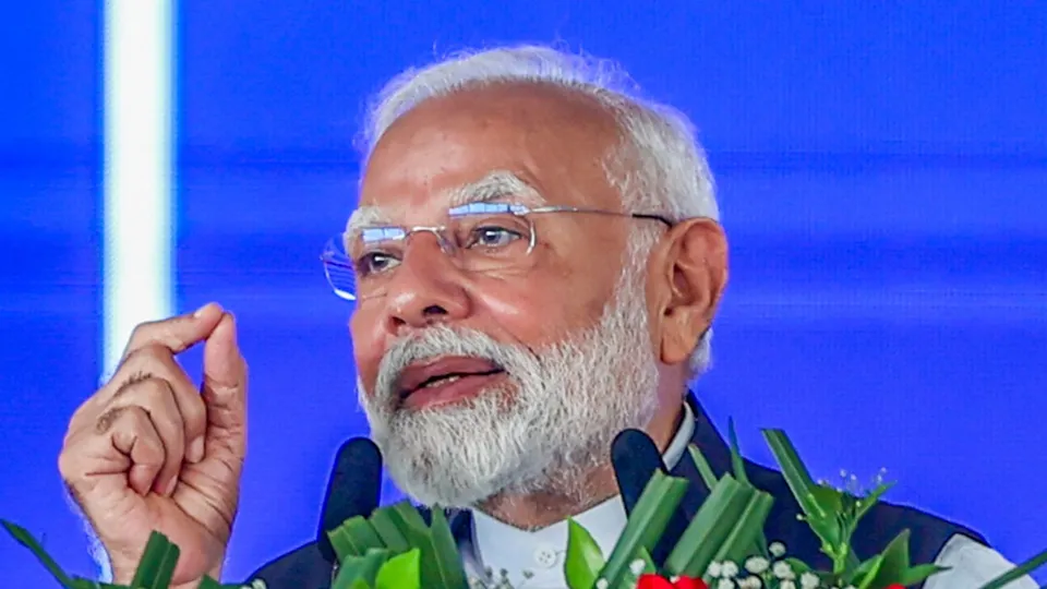 Prime Minister Narendra Modi speaks during 'Lakhpati Didi Sammelan', in Jalgaon, Sunday, Aug. 25, 2025.