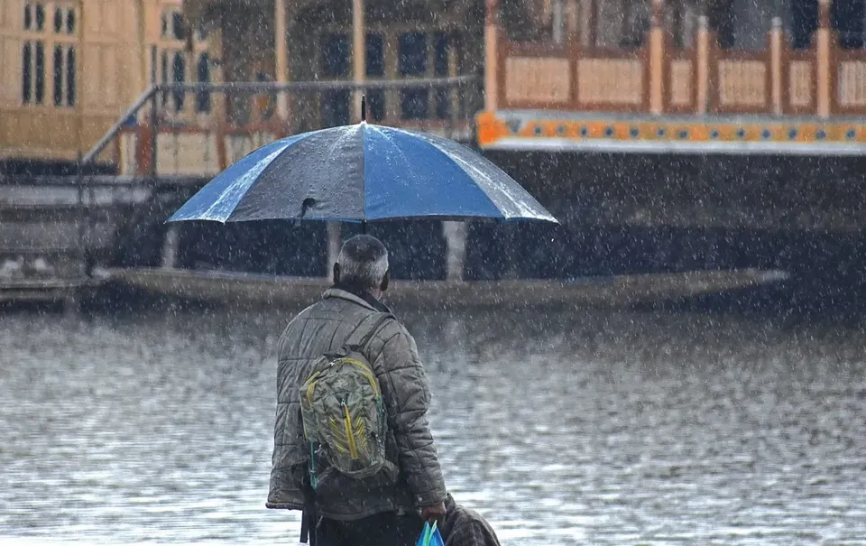 Kashmir reels under rain.jpg