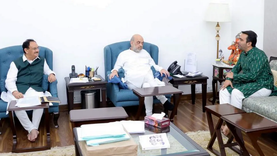 Amit Shah with JP Nadda and Jayant Chaudhary during a meeting