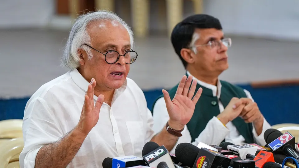 Congress leaders Jairam Ramesh and Pawan Khera during a press conference, in Mumbai