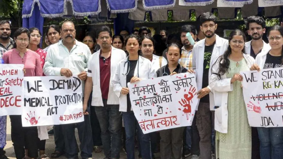 Doctors of Rajendra Institute of Medical Sciences stage a protest against the alleged rape and murder of a woman doctor at Kolkata's R G Kar Medical College and Hospital, in Ranchi