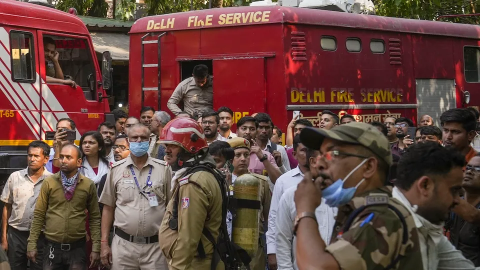 Firefighting team outside the Income Tax CR Building after a fire broke out here, in ITO area of New Delhi, Tuesday, May 14, 2024.