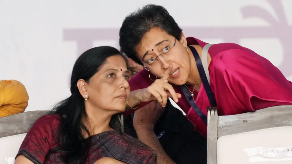 Delhi minister Atishi with Chief Minister Arvind Kejriwal's wife Sunita Kejriwal during INDIA block rally at Ramlila Ground in New Delhi