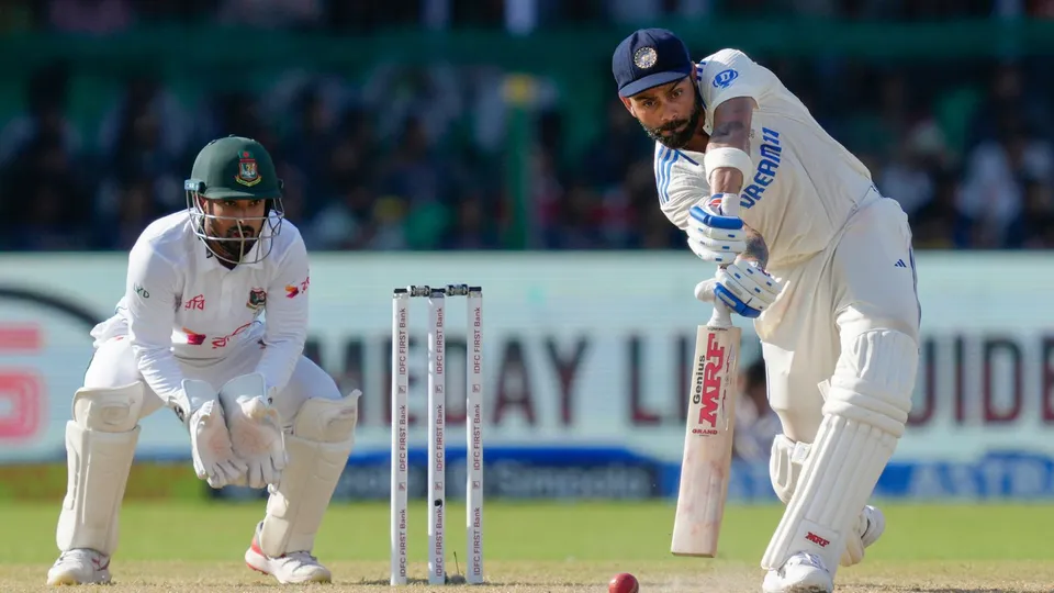 India's batter Virat Kohli plays a shot during the fourth day of the 2nd Test cricket match between India and Bangladesh, at the Green Park stadium, Kanpur, Monday, Sept. 30, 2024.