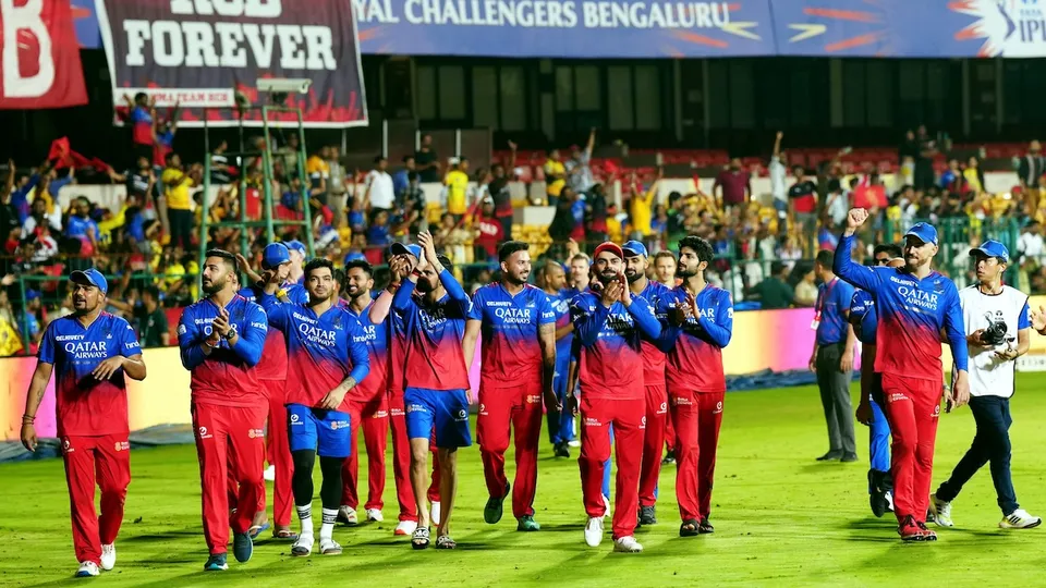 Royal Challengers Bengaluru players acknowledge fans as they celebrate after winning their Indian Premier League (IPL) 2024 cricket match against Chennai Super Kings, at M Chinnaswamy Stadium in Bengaluru, Saturday, May 18, 2024.