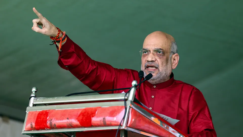 Union Home Minister Amit Shah speaks during a public meeting ahead of Telangana Assembly elections, in Jangaon