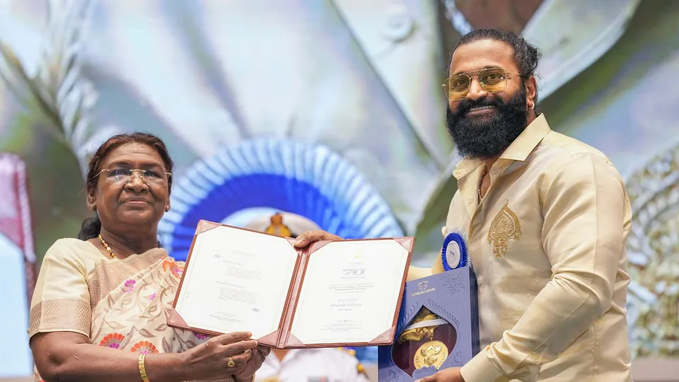 President Droupadi Murmu presents the award to actor and director Rishab Shetty during the 70th National Film Awards, at Vigyan Bhawan, in New Delhi, Tuesday, Oct. 8, 2024.