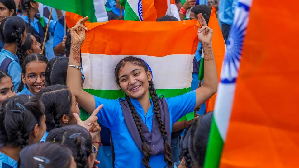 Students participate in a 'tiranga rally' during 'Har Ghar Tiranga' campaign ahead of the 78th Independence Day celebrations