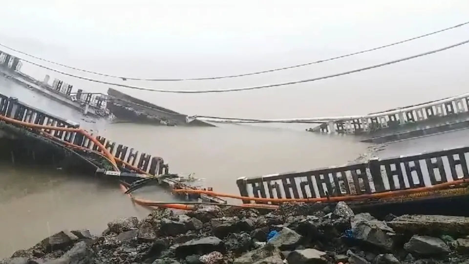 The bridge across the Kali River collapses near Karwar in Uttara Kannada district, Wednesday, Aug. 7, 2024.