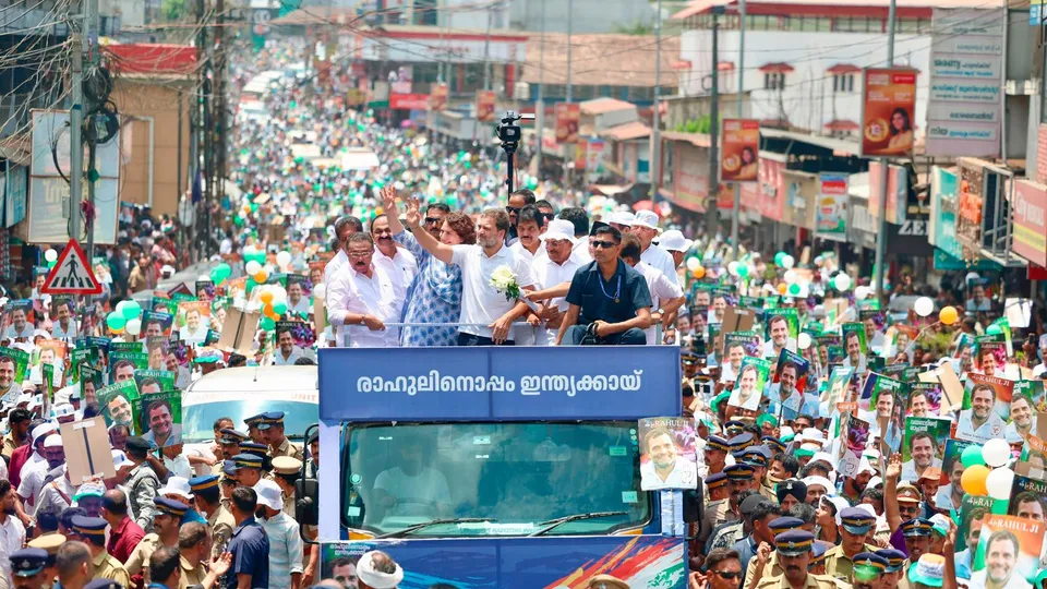 Congress candidate Rahul Gandhi with party leaders Priyanka Gandhi and K.C. Venugopal during a road show before filing his nomination papers for the upcoming Lok Sabha elections, in Wayanad district, Wednesday, April 3, 2024