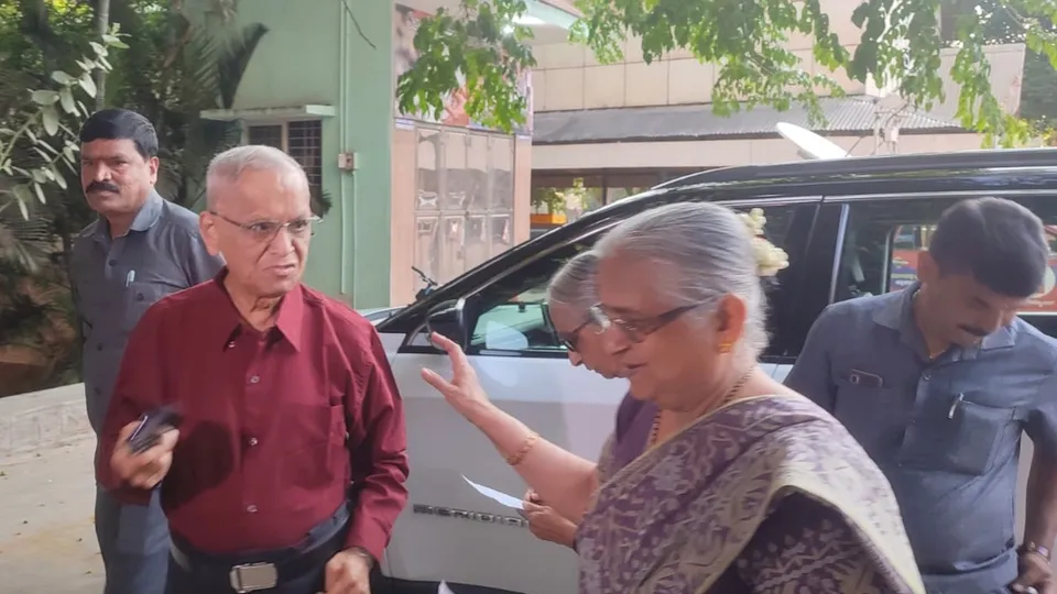 Infosys founder NR Narayana Murthy and Rajya Sabha MP Sudha Murty arrive at the polling station in Jaya Nagar, Bengaluru