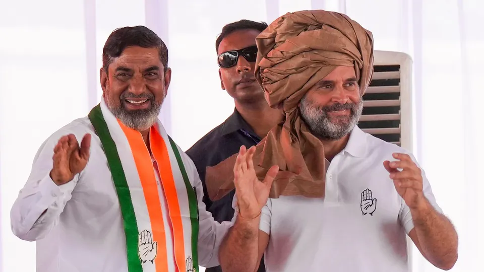 Congress leader Rahul Gandhi with party candidate from Nuh constituency Aftab Ahmed during the party's public meeting in Nuh, Haryana, Thursday, Oct. 3, 2024.