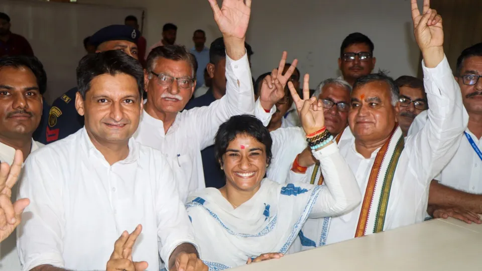 Congress leader Deepender Hooda, former wrestler and Congress candidate from Julana constituency Vinesh Phogat and others during her nomination filing for the upcoming Haryana Assembly elections, in Jind district, Wednesday, Sept. 11, 2024.