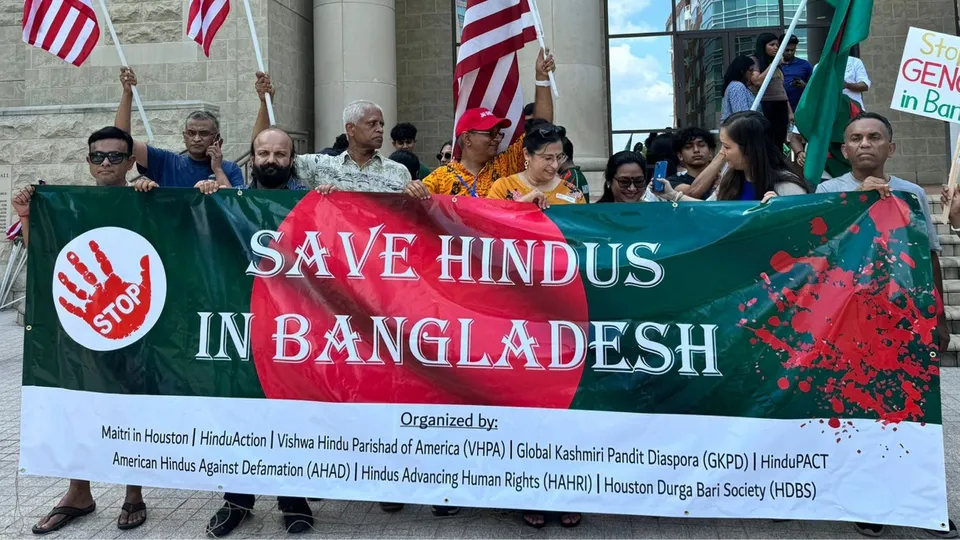 People stage a protest over the violence against minorities in Bangladesh, in Houston, USA, Sunday, Aug. 11, 2024.