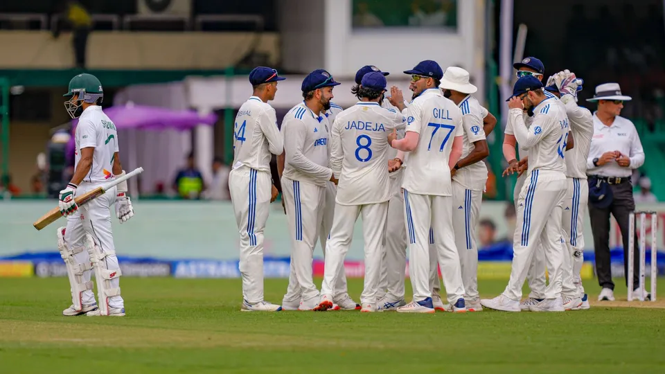India's Akash Deep with teammates celebrates the wicket of Shadman Islam during the first day of the 2nd cricket Test match between India and Bangladesh at the Green Park Stadium, in Kanpur, Friday, Sept. 27, 2024.