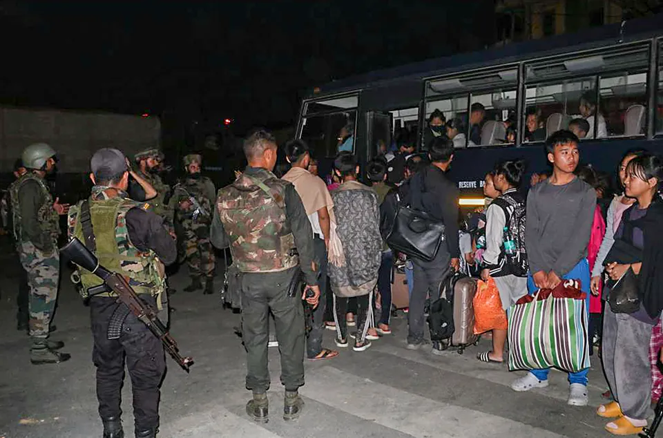 Indian Army and Assam Rifles personnel rescue civilians from violence-hit areas, in Manipur