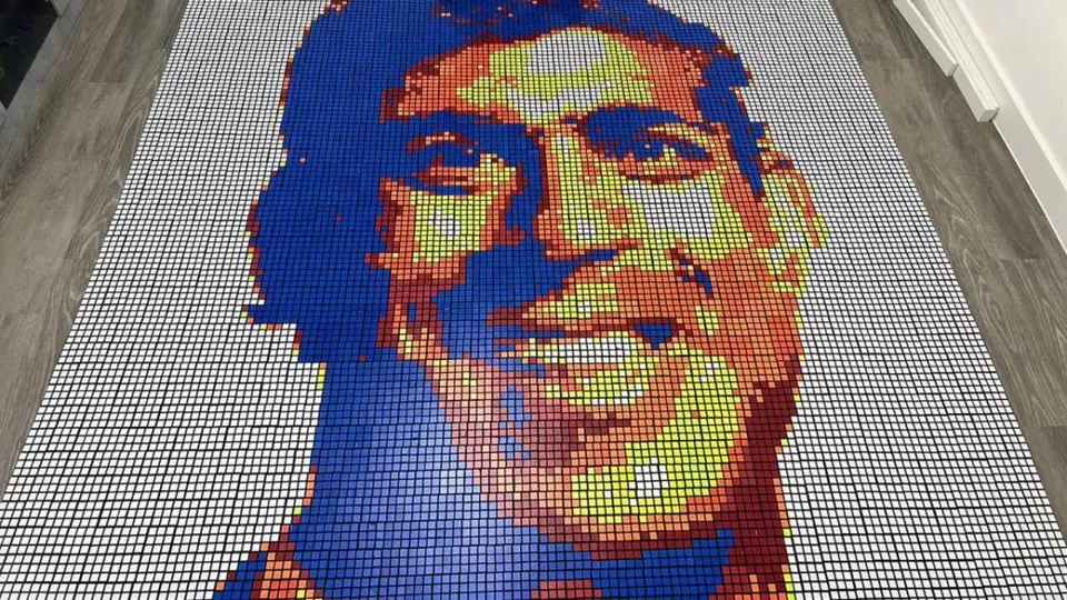 A giant artwork by Henil Soni depicting Prime Minister Rishi Sunak by using his Rubik’s Cube solving skills