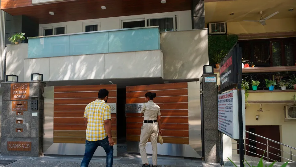 A police personnel arrives at the office of NewsClick at Saket during raids by Delhi Police's Special Cell on its premises, in New Delhi