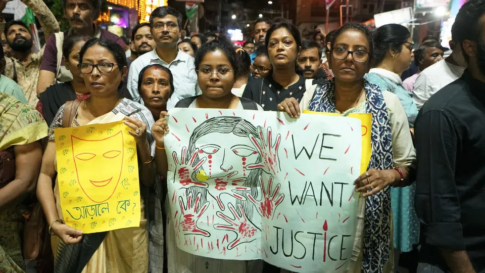 People take part in a protest over the alleged sexual assault and murder of a trainee doctor, in Kolkata, Sunday, Sept. 8, 2024.